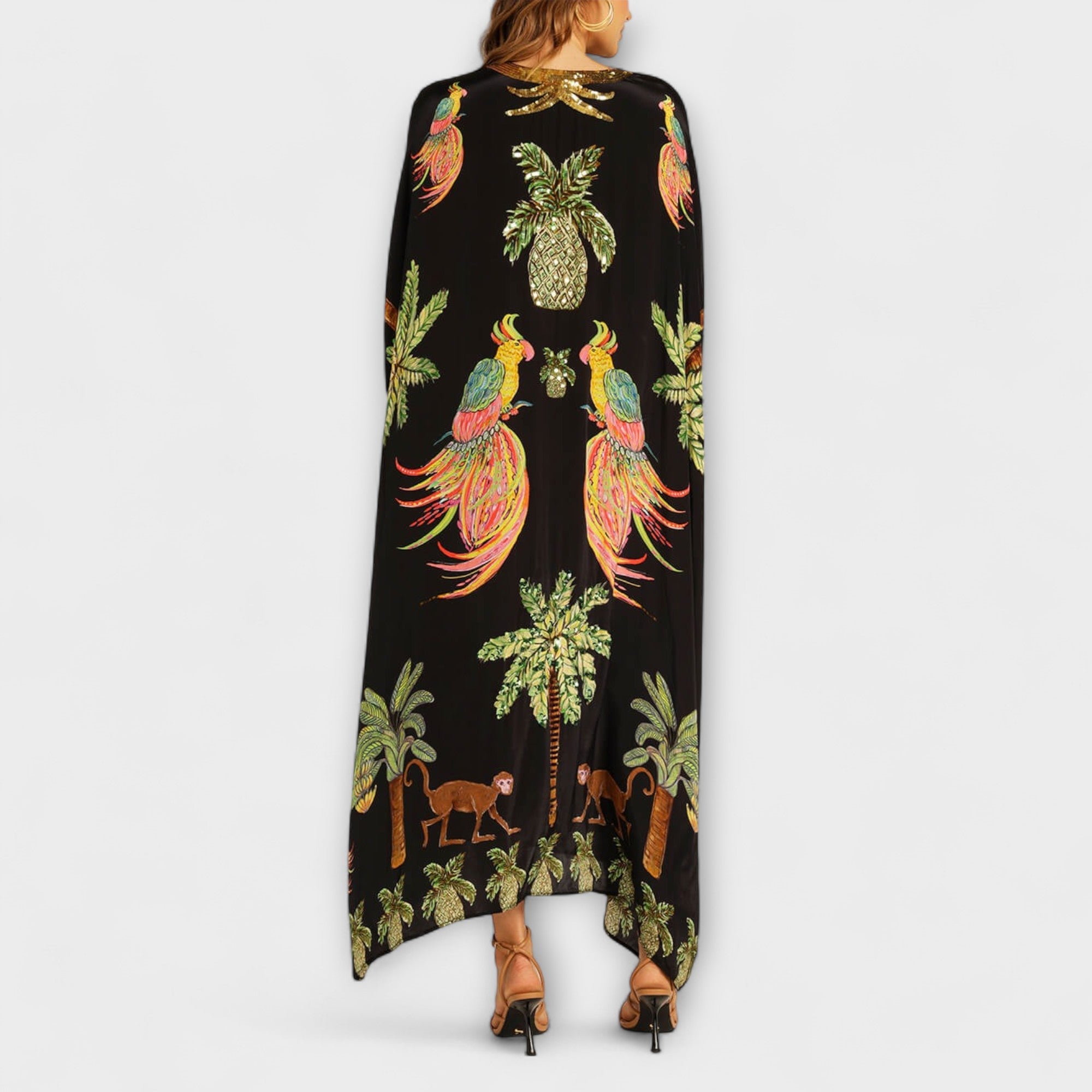 Linda - Iøjnefaldende kjole med off-shoulder design og kokosnøddeprint