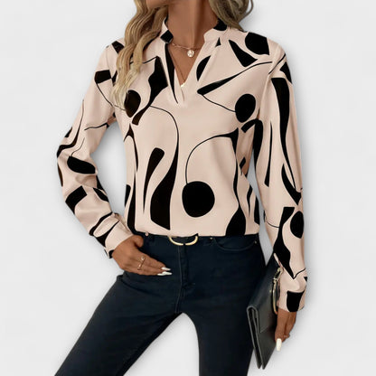Elegant bluse med lange ærmer og spidse udskæring