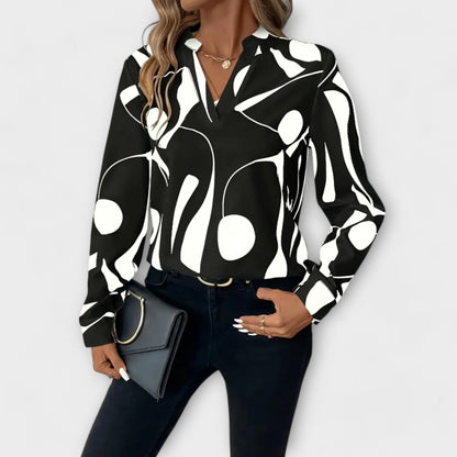 Elegant bluse med lange ærmer og spidse udskæring