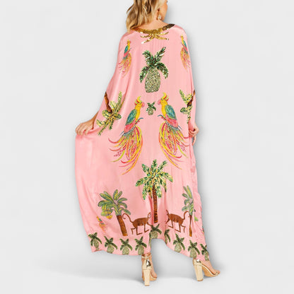 Linda - Iøjnefaldende kjole med off-shoulder design og kokosnøddeprint